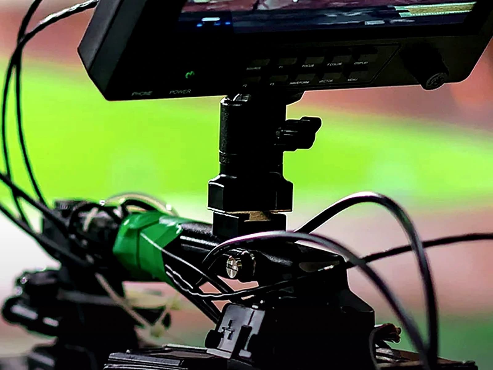 Broadcast camera and monitor set up for live streaming a sports event.